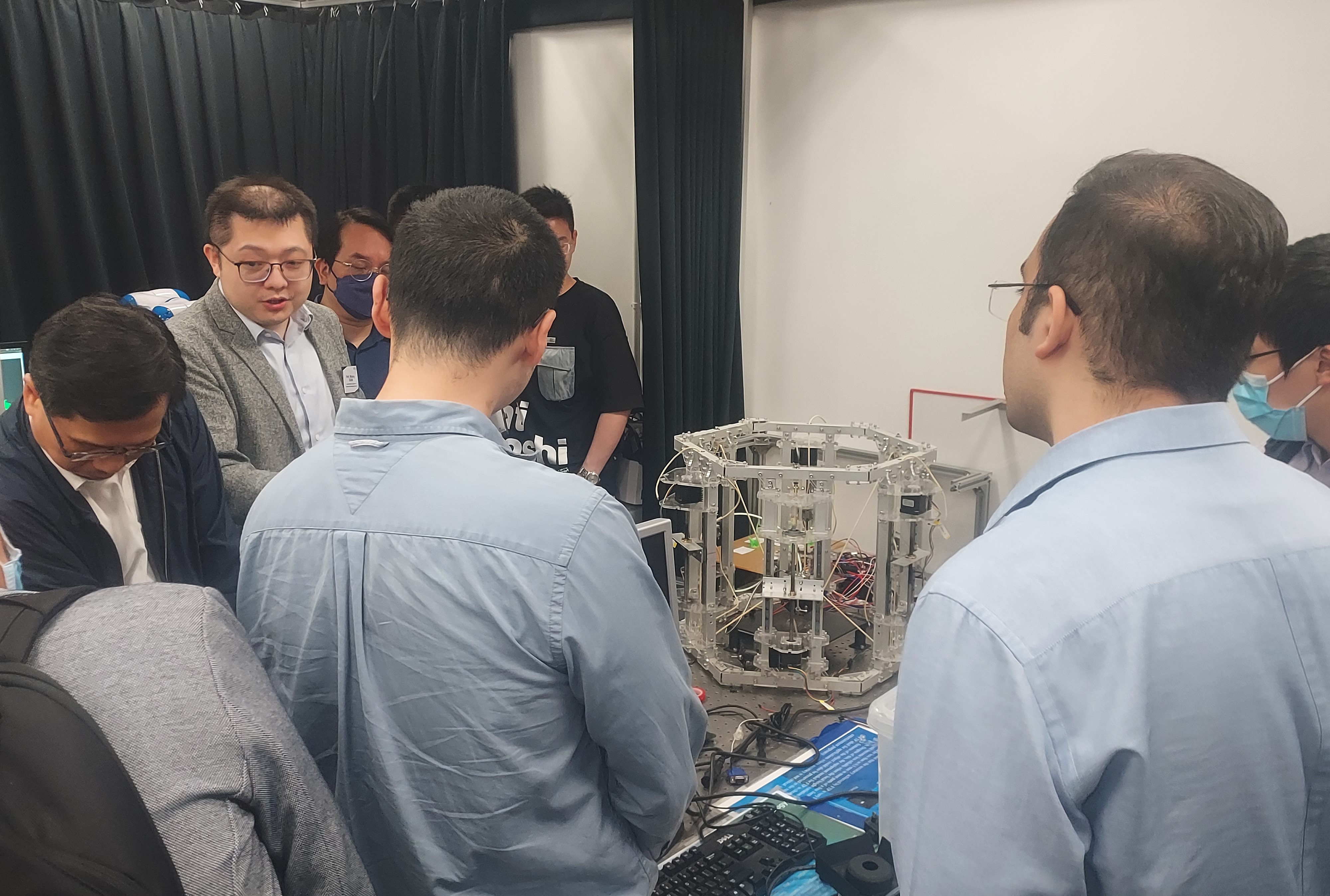 Lab visit led by Prof. Molong Duan on boom-lifted mounted robot
